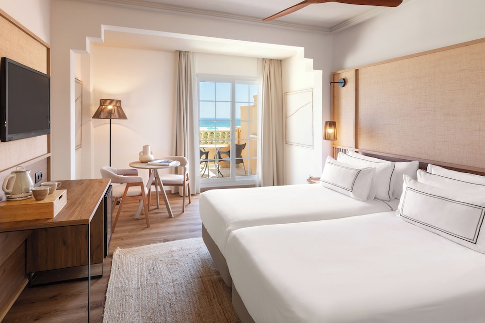 غرفة متصلة بريميوم عائلية بسريرين منفصلين بإطلالة على البحر، Melia Atlantico Isla Canela 3/8