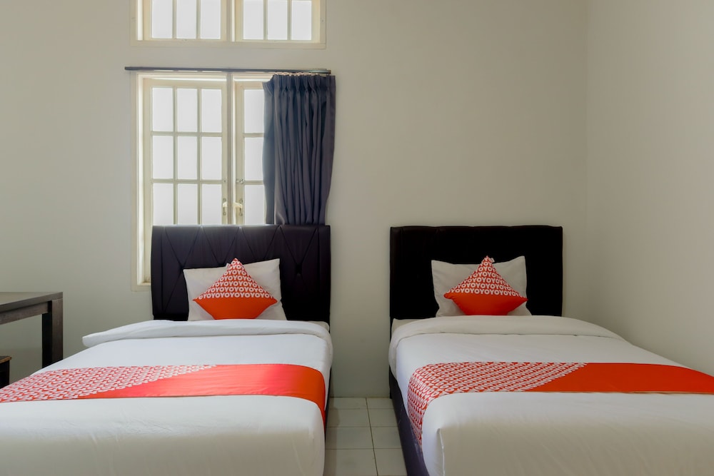 OYO 1111 Passer Baroe Inn 13/26