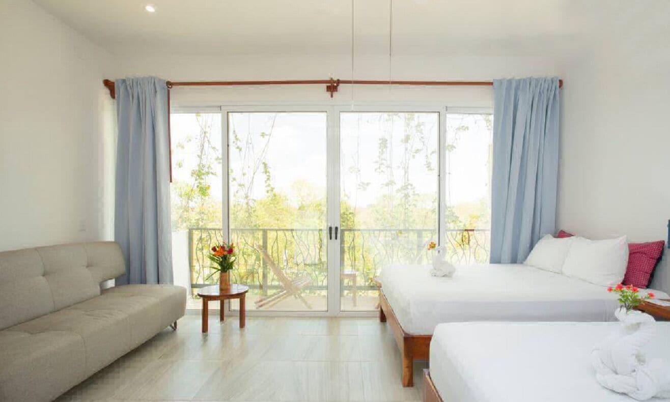 جناح فاخر اقتصادي تنفيذي بسريرين مزدوجين مع أريكة، Ocean Zen Suites 5/8