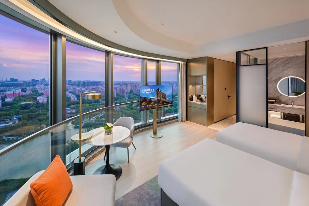 غرفة ديلوكس بسريرين منفصلين، Novotel Shanghai Wanyuan 4/6