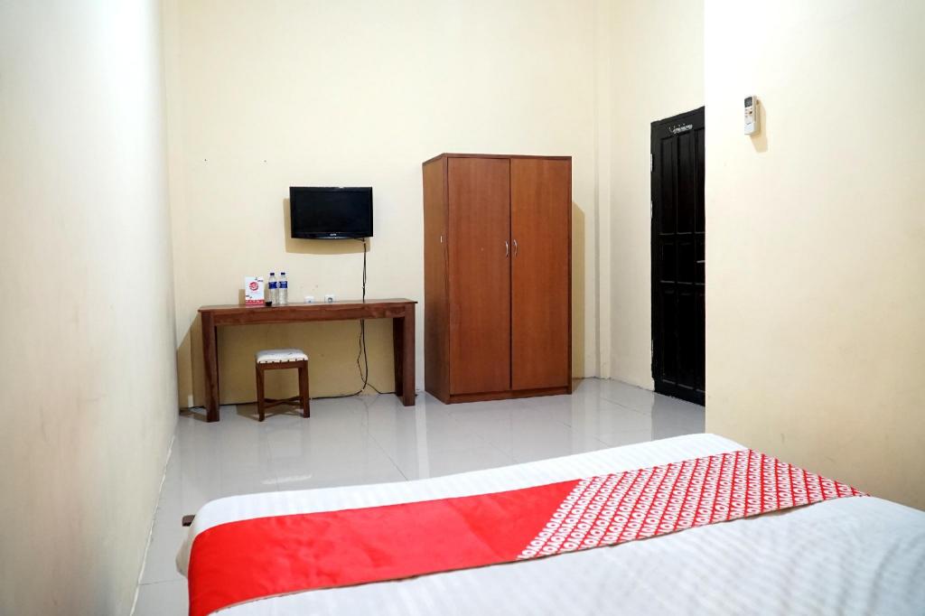 OYO 1034 Pondok Mulia Guest House 21/33