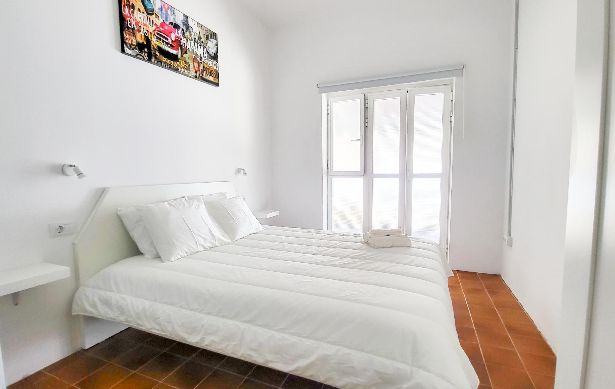 غرفة بسرير مزدوج بحمام خاص