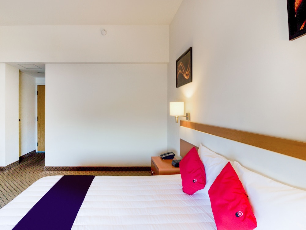 Capital O Hotel Herederos, Piedras Negras 7/35
