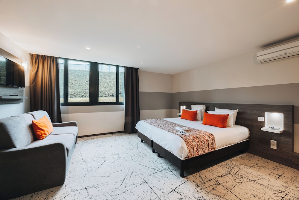 غرفة تنفيذية بسرير كينج مع أريكة، Best Western Portes d Aquitaine Agen Sud 3/8