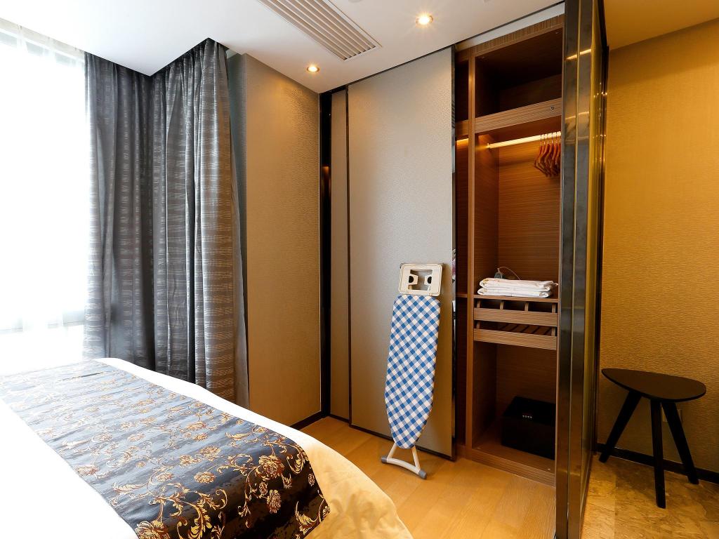 جناح تنفيذي بسرير كينج بغرفة نوم واحدة، Pengman International Apartment Hotel (Beijing Road Jiedeng Duhui) 8/10