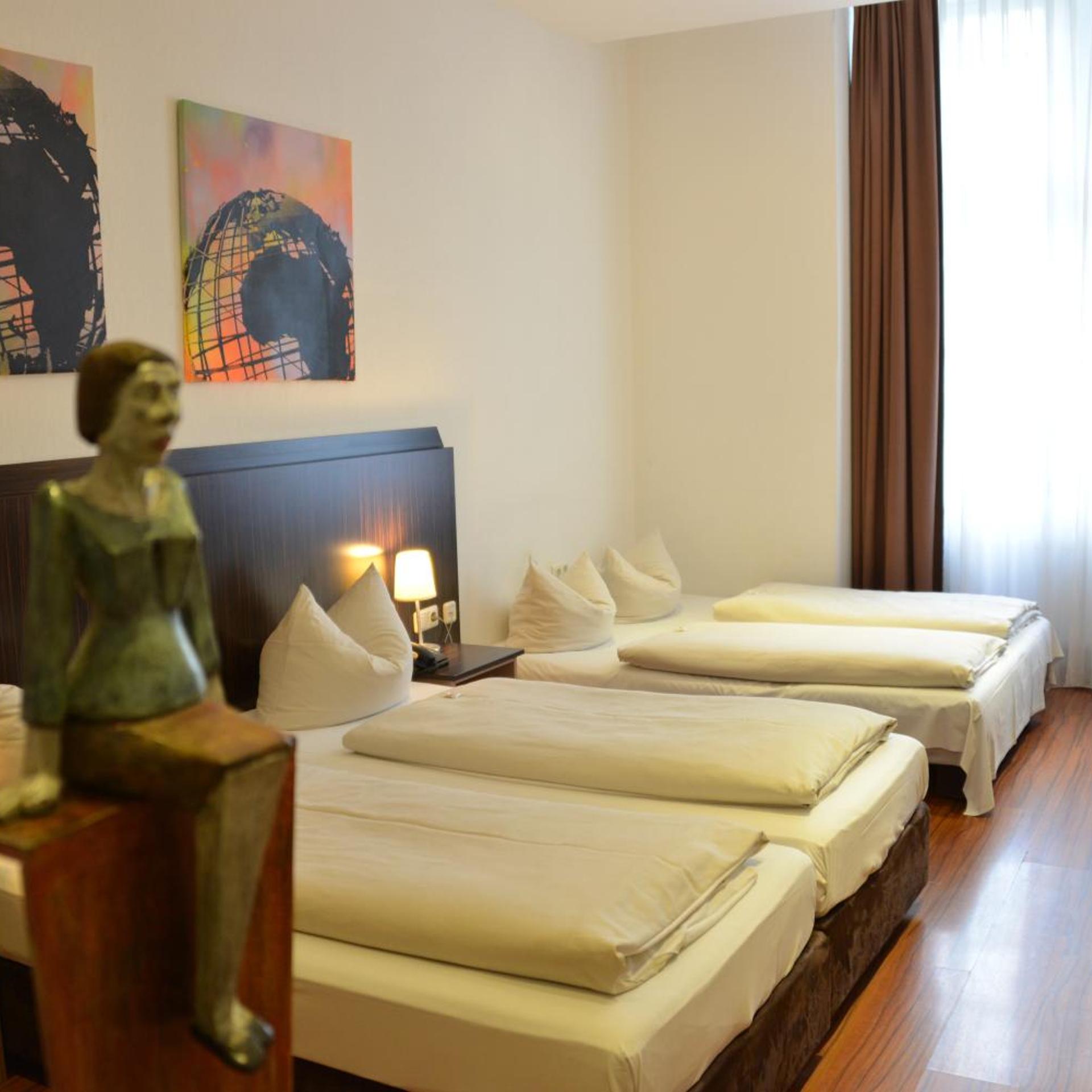 غرفة رباعية بسرير فردي، Arthotel Munich 5/10