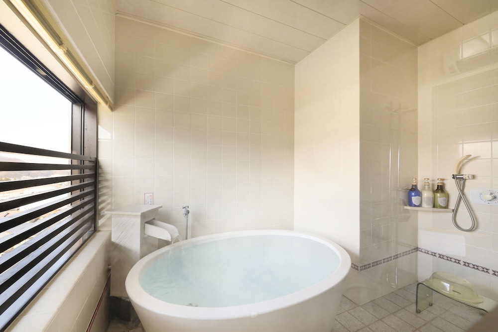 جناح ديلوكس بسريرين منفصلين وفرشتي فوتون بحمام خاص، Hotel Tsubakino 3/3