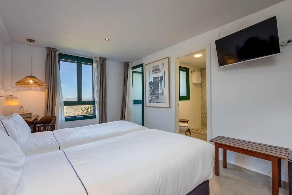 TUGASA Hotel Arco de la Villa 6/47