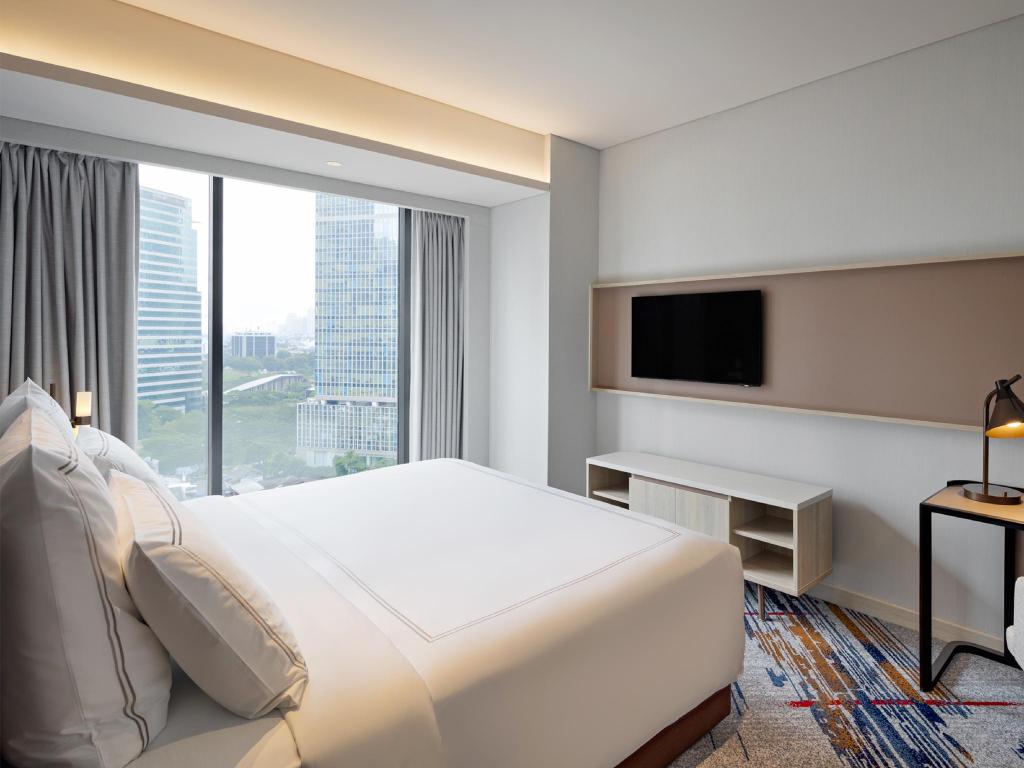 2 Bedrooms, Signature, Swiss, Apartment, King and Queen Bed، Swissotel Living Jakarta Mega Kuningan 2/8