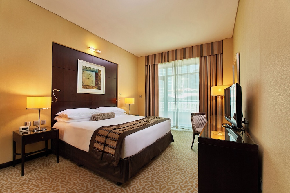 غرفة ديلوكس بسرير كينج بإطلالة على المسبح، TIME Oak Hotel and Suites 6/9