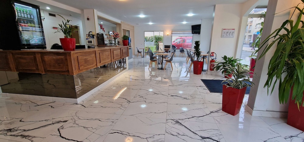 Kyriad Direct Arpajon 7/50