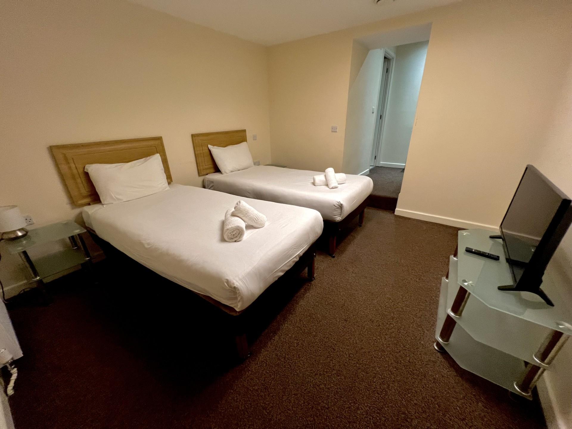Small Double, Twin Beds, No Window