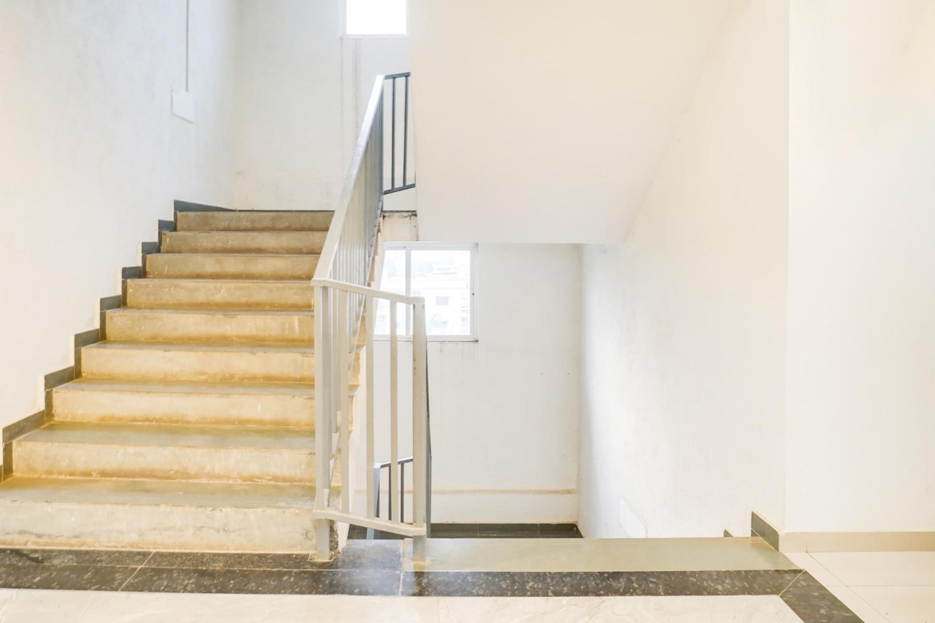 Super Townhouse Lohegaon Near Pune Airport formerly Landmark Regency 21/29
