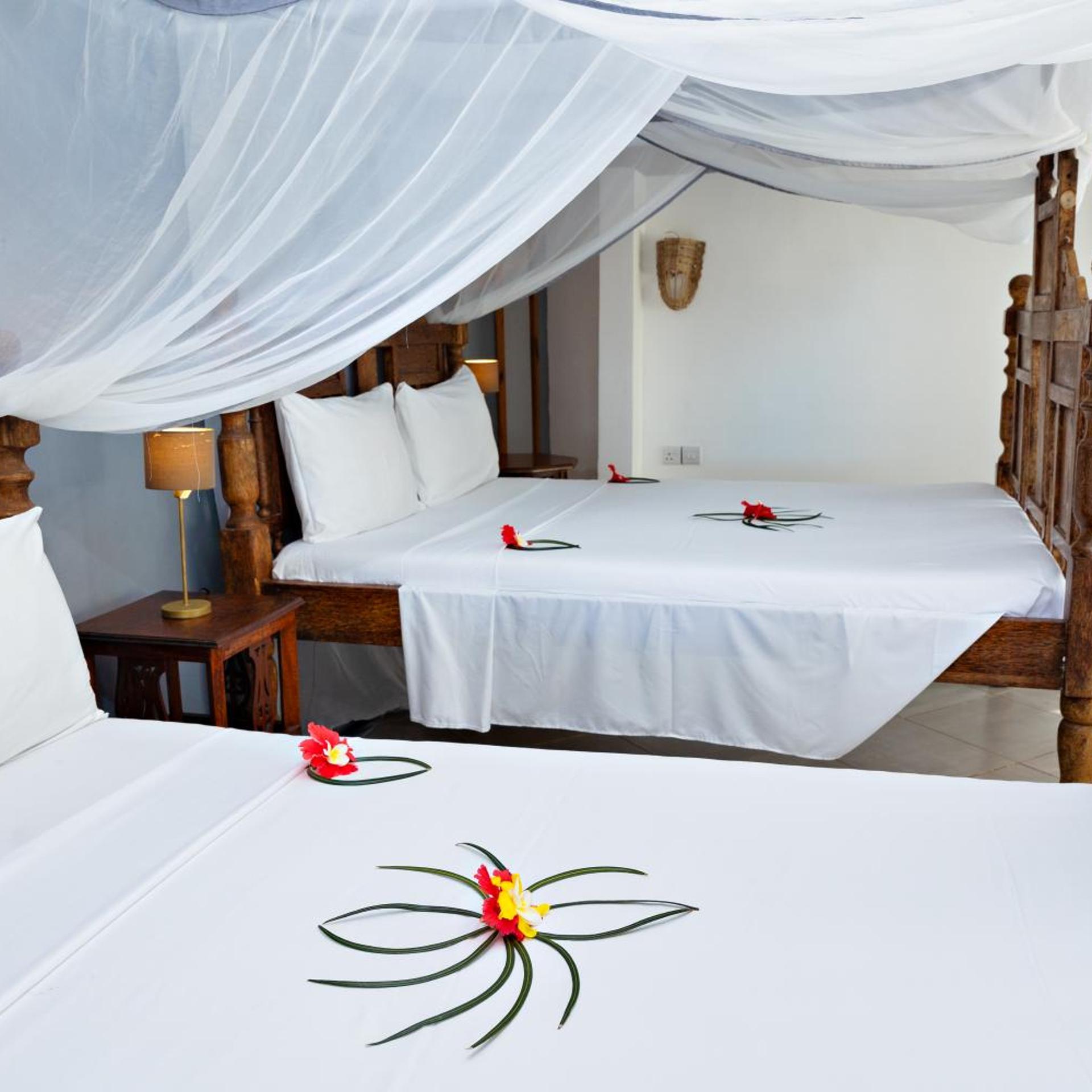 غرفة عائلية بإطلالة على البحر، Tanzanite Beach Resort 2/3