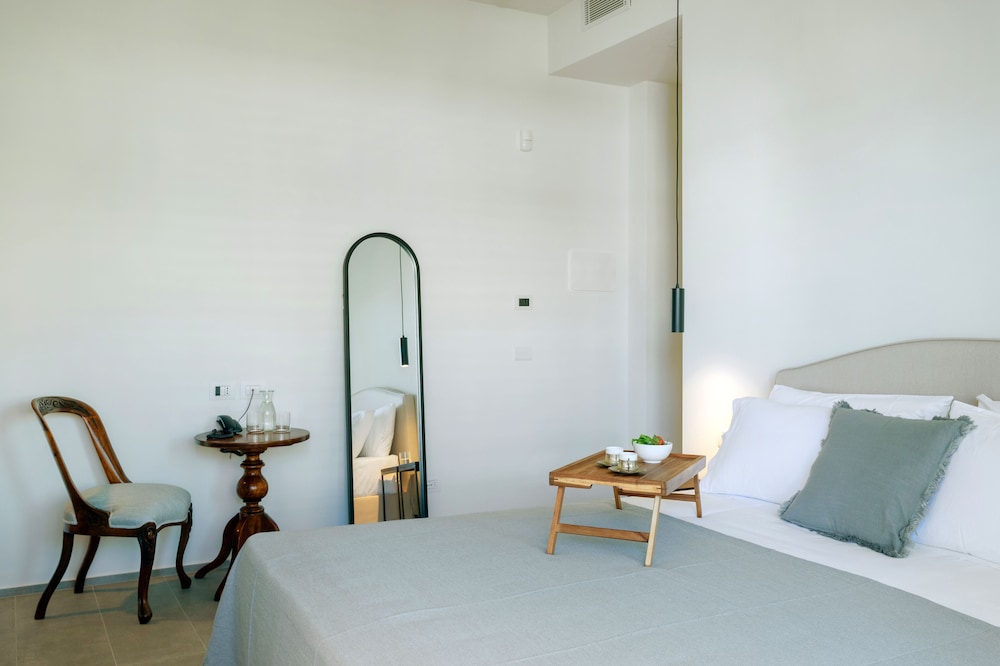 غرفة ديلوكس بسرير كوين بشرفة، Domia Boutique Hotel Mondello 4/8