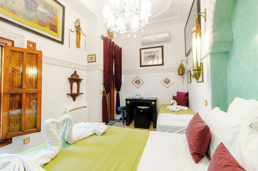 Riad Asrari 16/49