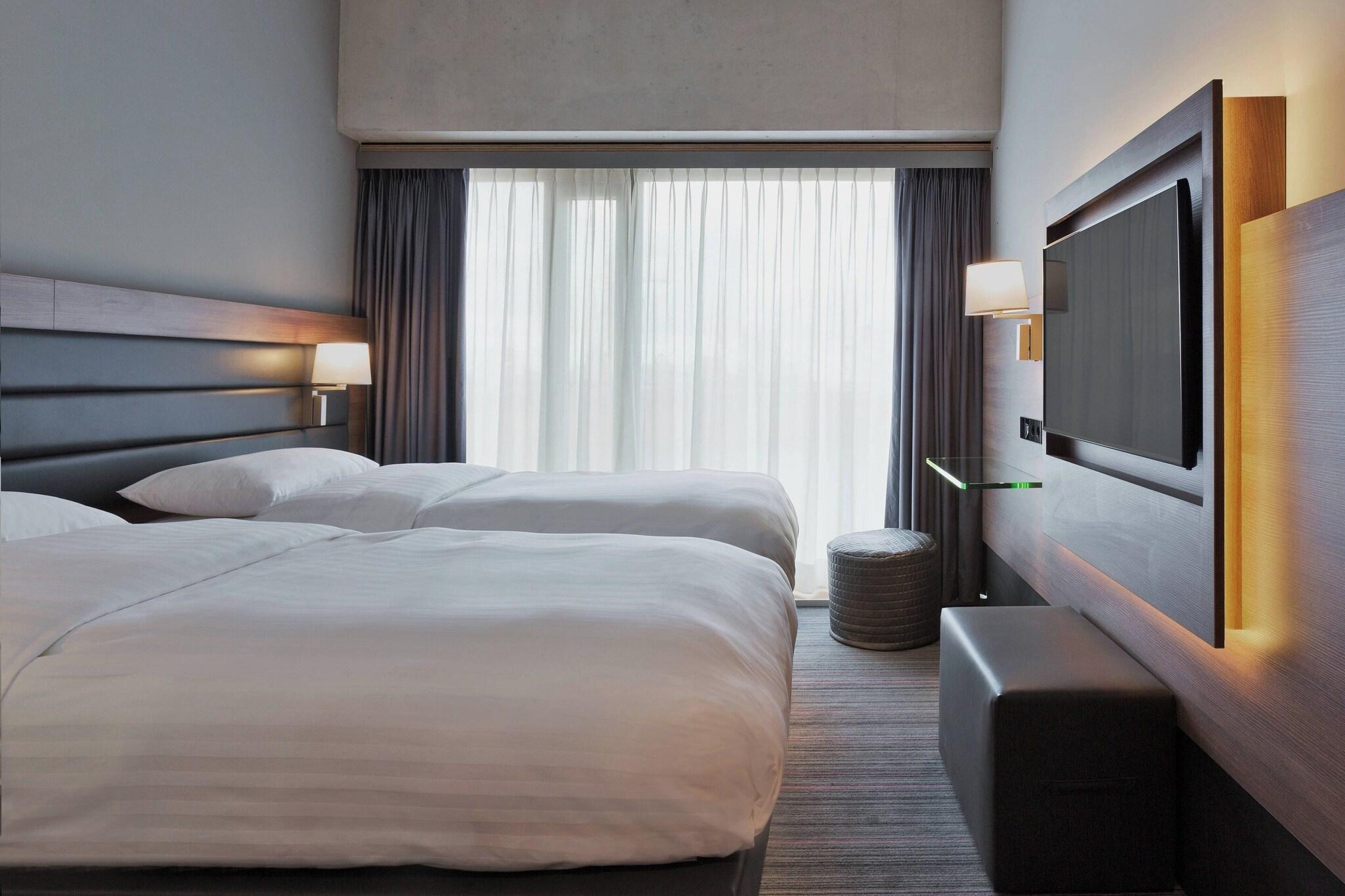 غرفة قياسية بسريرين منفصلين، Moxy Amsterdam Houthavens 2/7