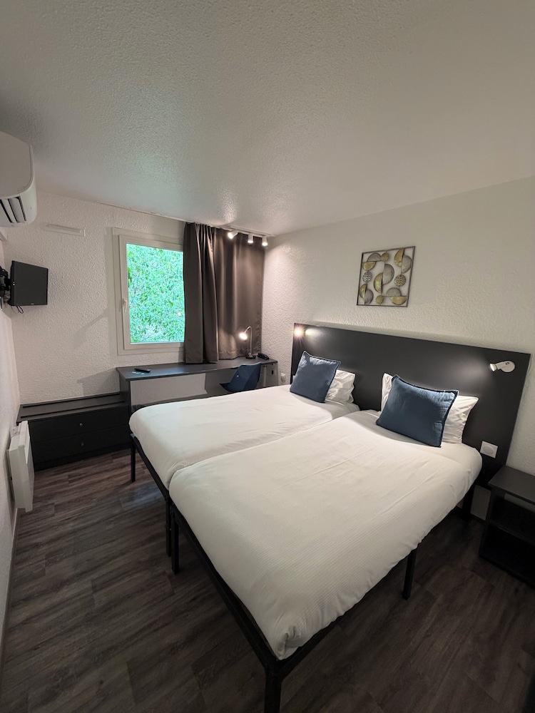 Brit Hotel Les Colonnes 9/21