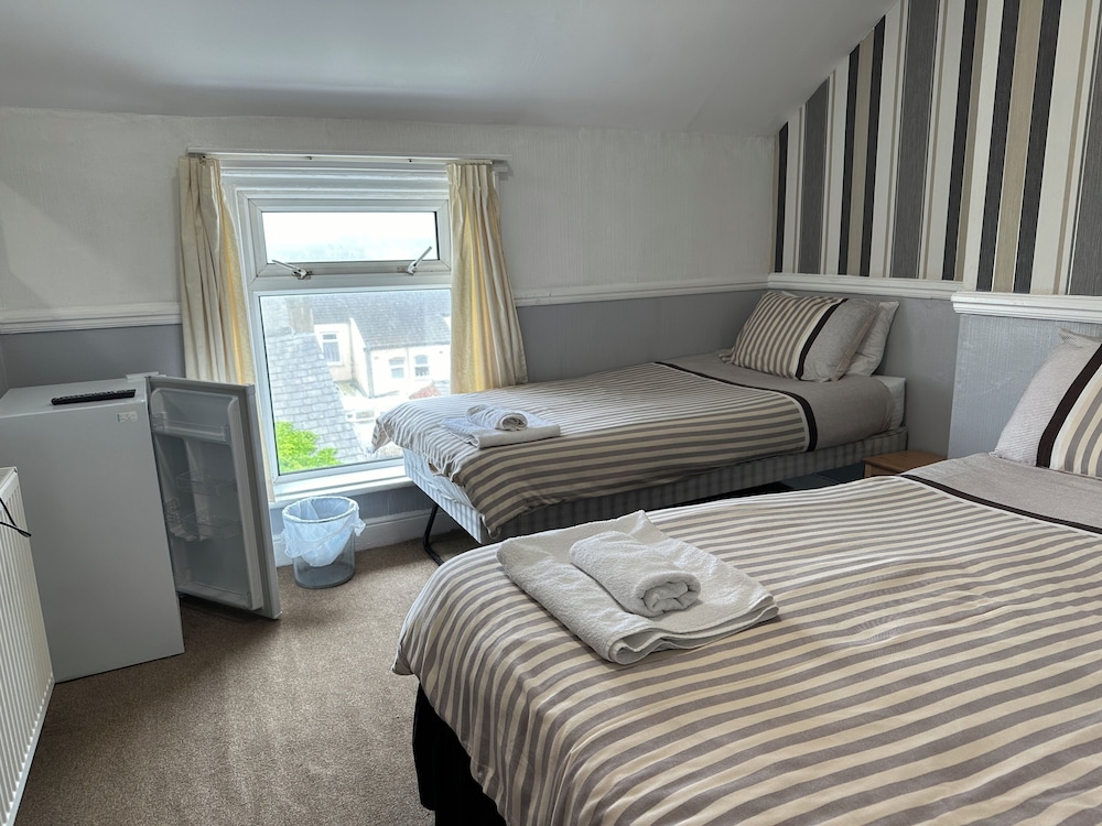 Family, 1 Double and 3 Single Beds