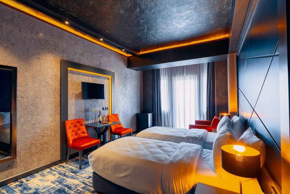 غرفة ديلوكس بسرير مزدوج أو سريرين منفصلين بإطلالة على البحر، Tapis Rouge Design Boutique Hotel 2/10