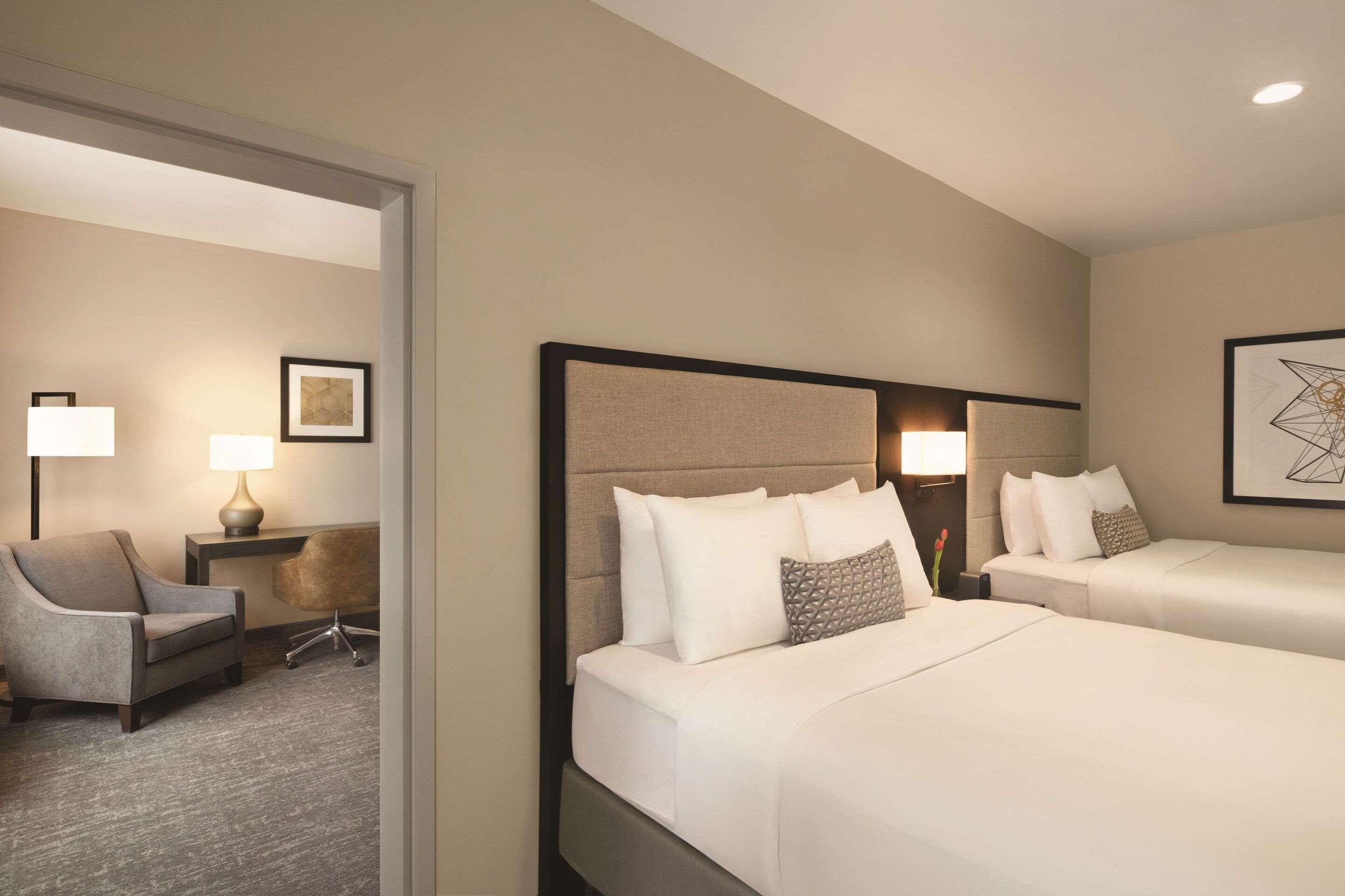 SUITE, 1 KING AND 2 QUEEN BEDS