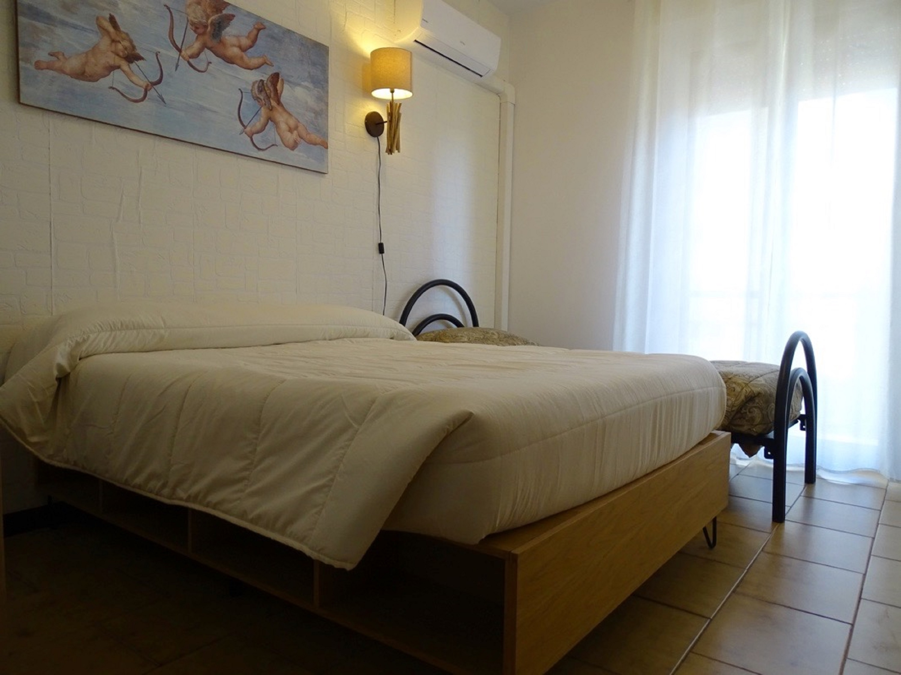 غرفة بسريرين منفصلين بحمام مشترك، Casa Papapietro 3/5