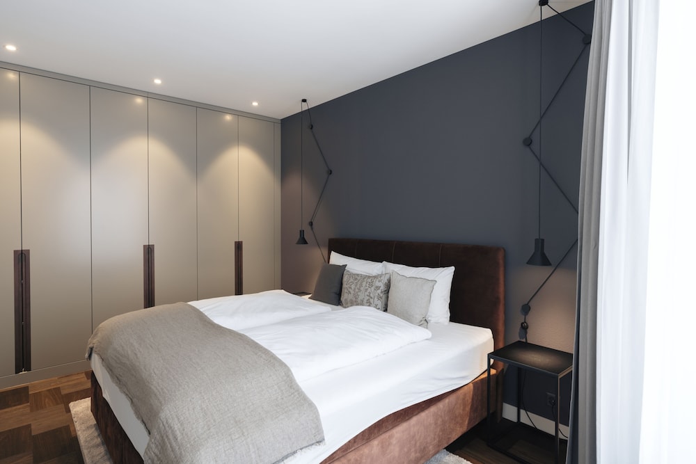 شقة ديلوكس بسريرين كوين بغرفتي نوم مع أريكة، Andermatt Alpine Apartments 4/9