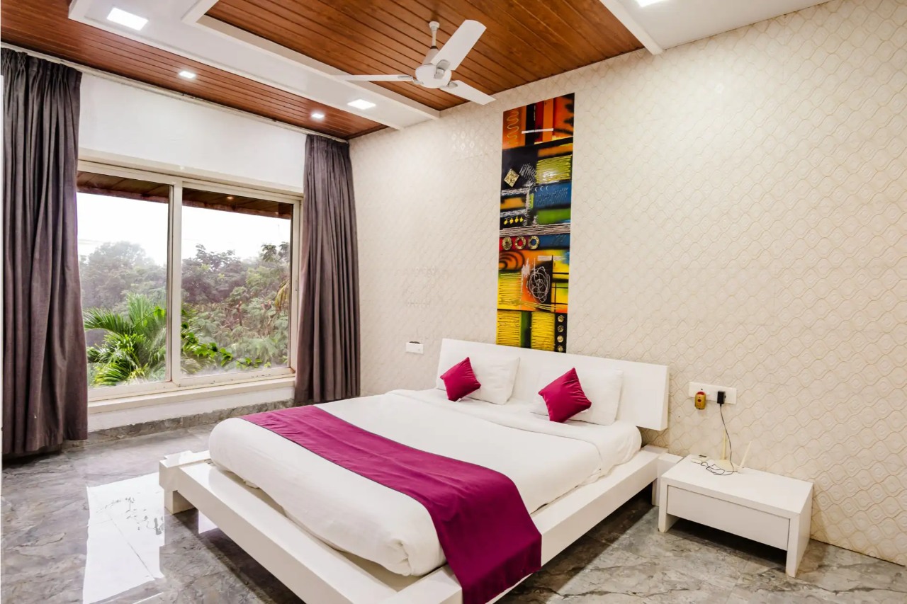 Room at ELIVAAS Moonstone Meadows 9 BHK Retreat With Private Pool, Garden, Gazebo and Jacuzzi, LONAVALA