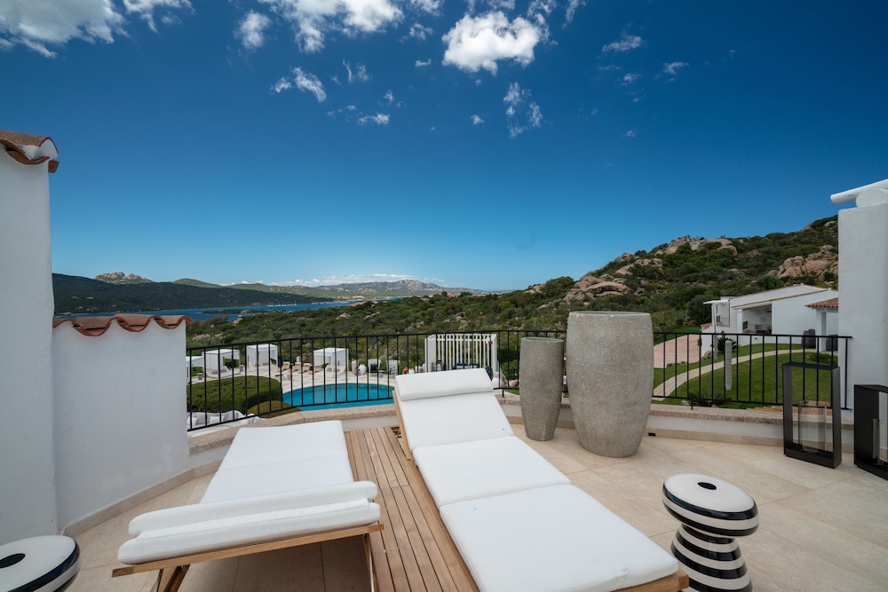Sulia House Porto Rotondo, Curio Collection by Hilton 3/99