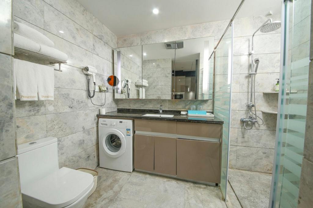 جناح تنفيذي بسرير كينج بغرفة نوم واحدة، Pengman International Apartment Hotel (Beijing Road Jiedeng Duhui) 10/10