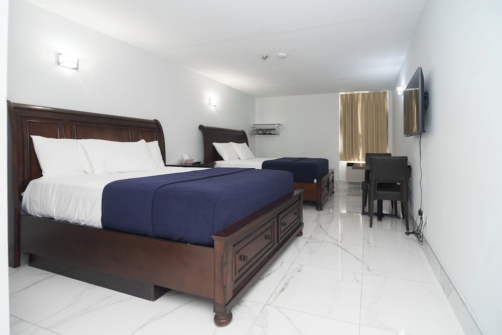 EXECUTIVE, 2 QUEEN BEDS