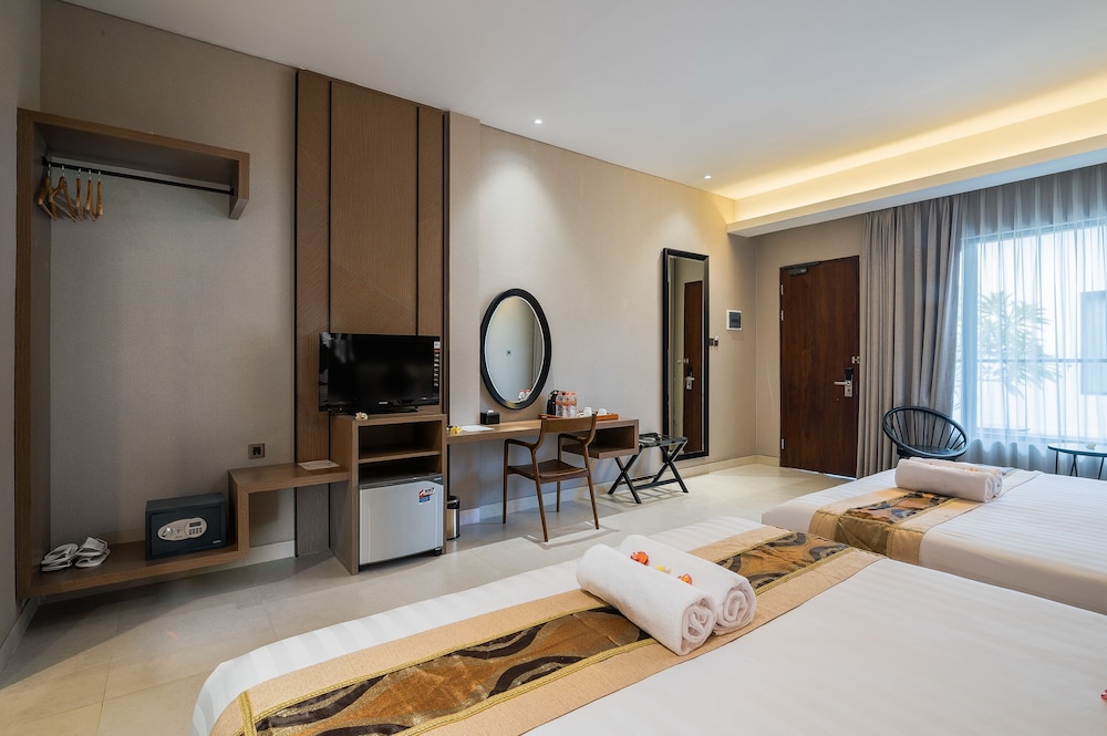 غرفة ديلوكس عائلية بسريرين كوين بإطلالة على الحديقة، Padma Sari Hotel 3/5