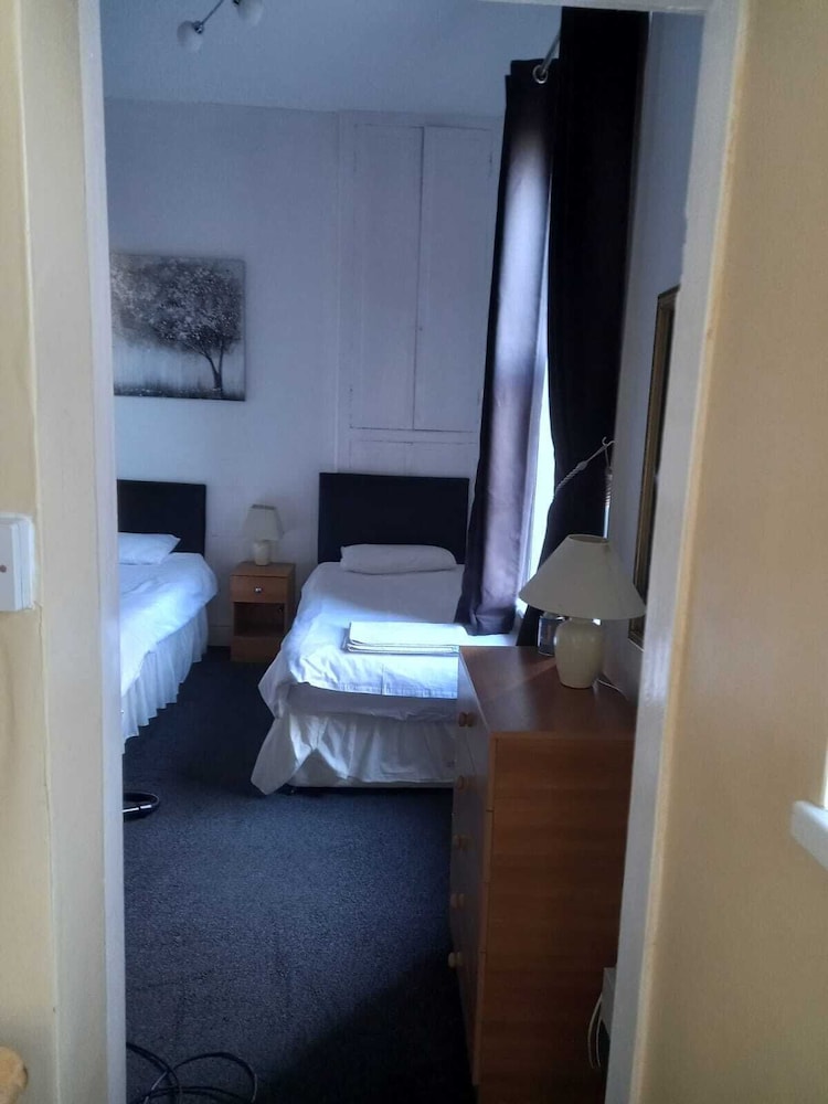 Flat, Twin Beds