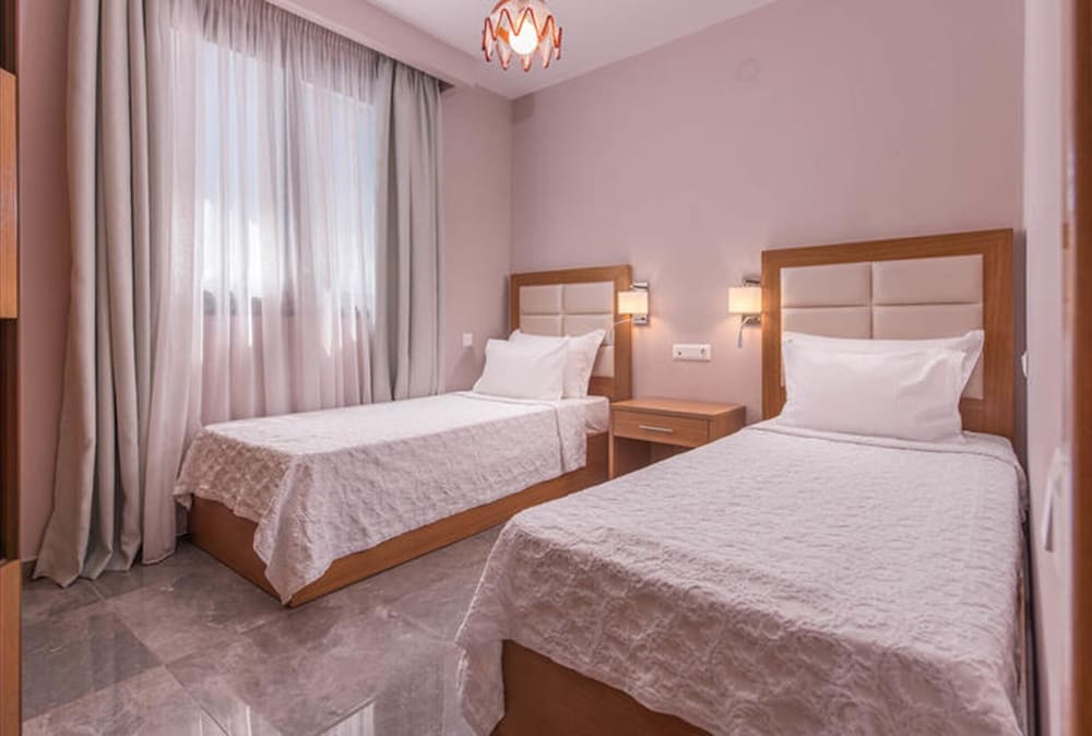 Dionysos Hotel Suites 12/68