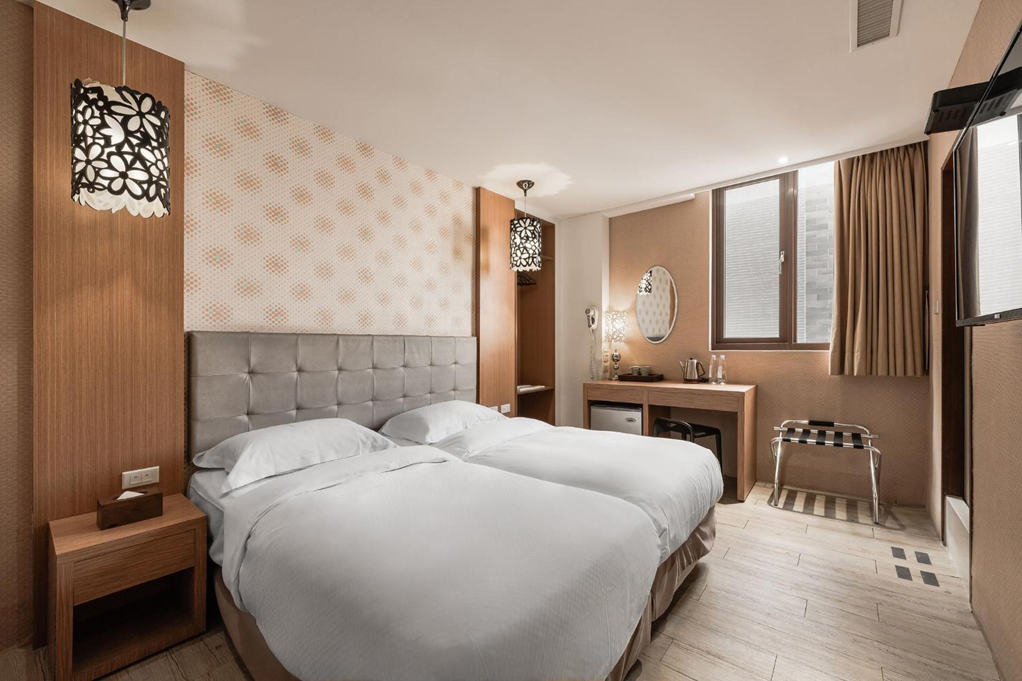 غرفة بسريرين منفصلين، The Riverside Hotel Hengchun 2/6