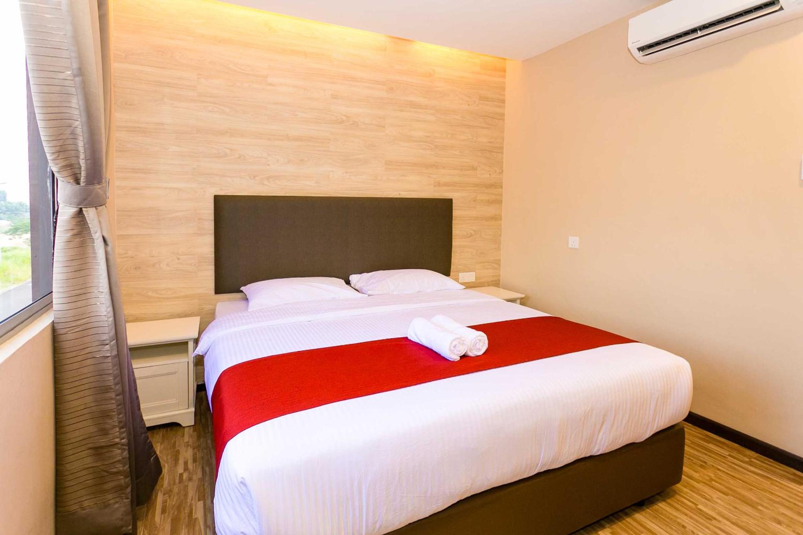 غرفة ديلوكس بسرير كينج وسرير كوين، Icon Hotel 4/5