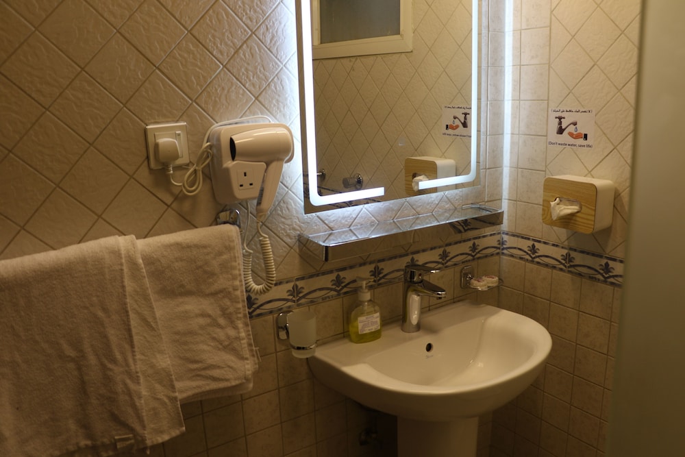 العلياء(Al Alya Hotel Rooms and Suites) 19/19