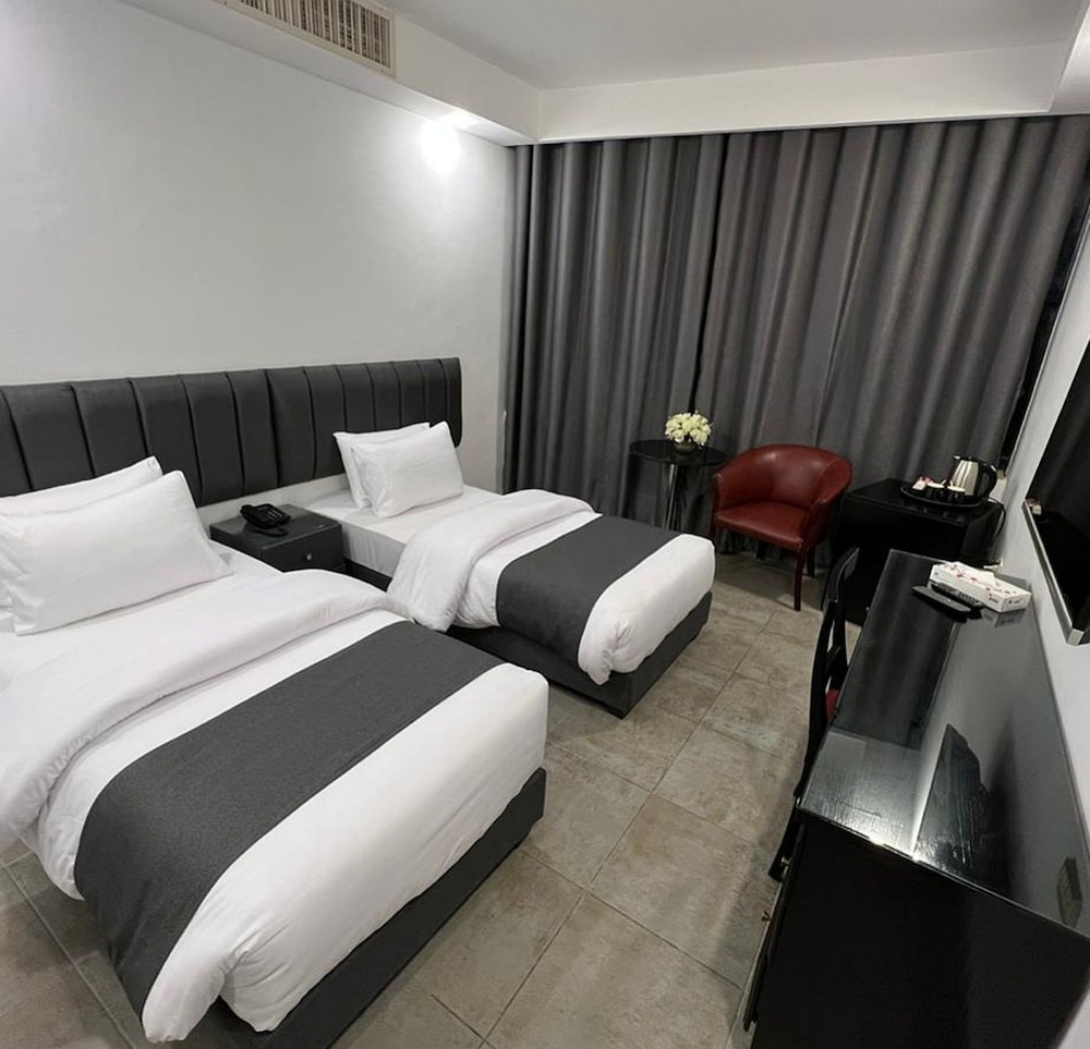 RUM HOTELS - AL WALEED 14/66