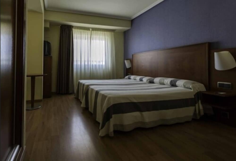 Apartamentos Torreluz 26/72