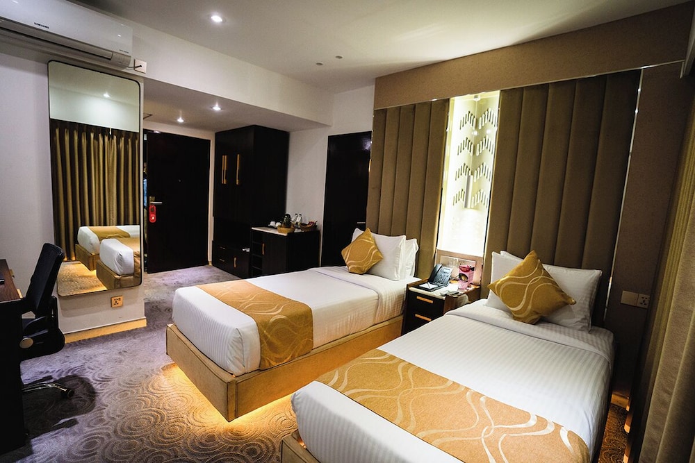 غرفة ديلوكس بسريرين منفصلين، Unique Regency Hotel Dhaka 2/10