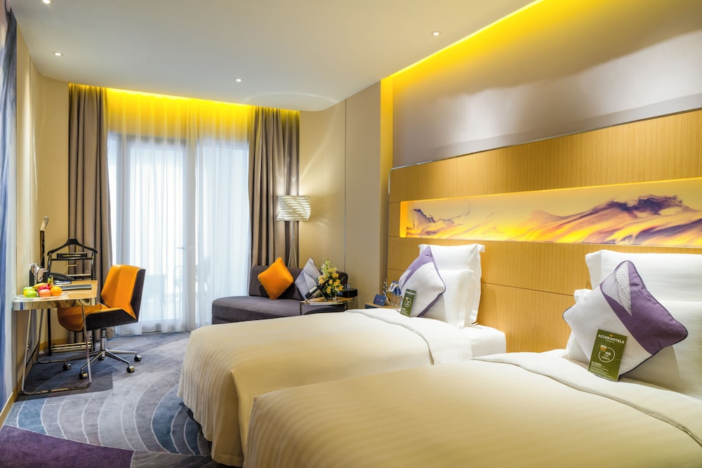 غرفة ديلوكس بسريرين منفصلين بشرفة، Novotel Suzhou Sip 3/5