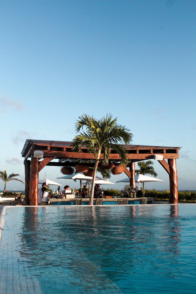 The Palm at Playa 63/77