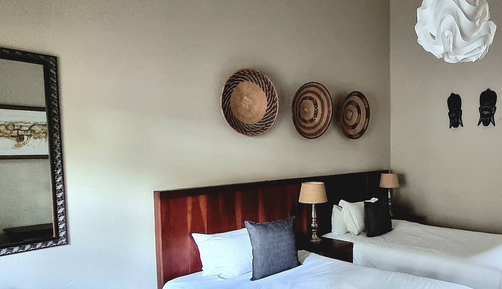 غرفة بسريرين منفصلين، African Roots Guest House 3/4