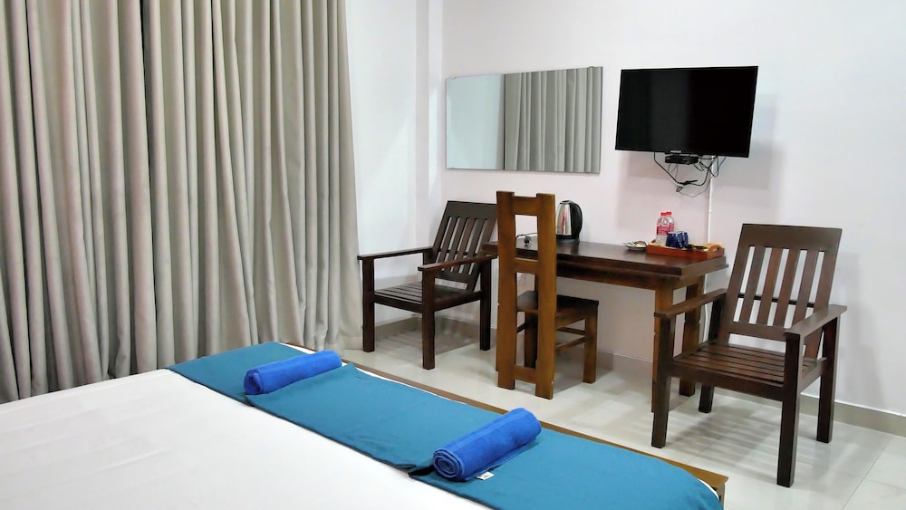 غرفة ديلوكس بسرير كينج بإطلالة على الحديقة، Nine Arch Holiday Resort 5/8