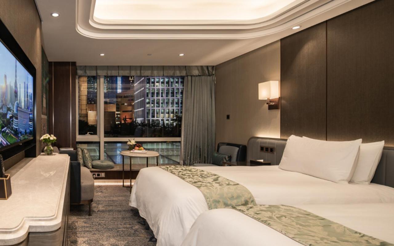 غرفة سوبيريور بسريرين منفصلين بإطلالة على الحديقة، Oriental Riverside Hotel Shanghai International Convention Center 3/5