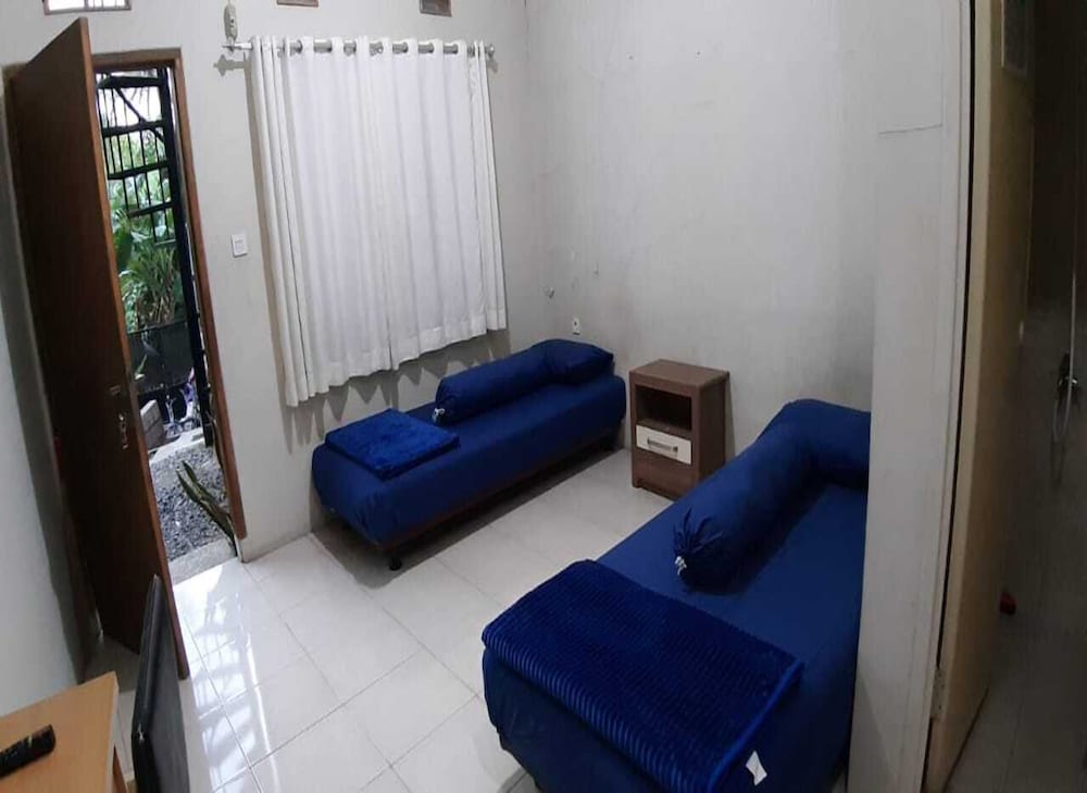 Nabila Syar i Guesthouse by ZUZU 11/19