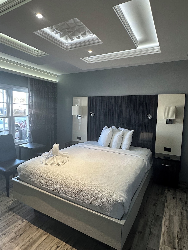 غرفة قياسية بسرير كوين، Marion Motor Lodge 3/8