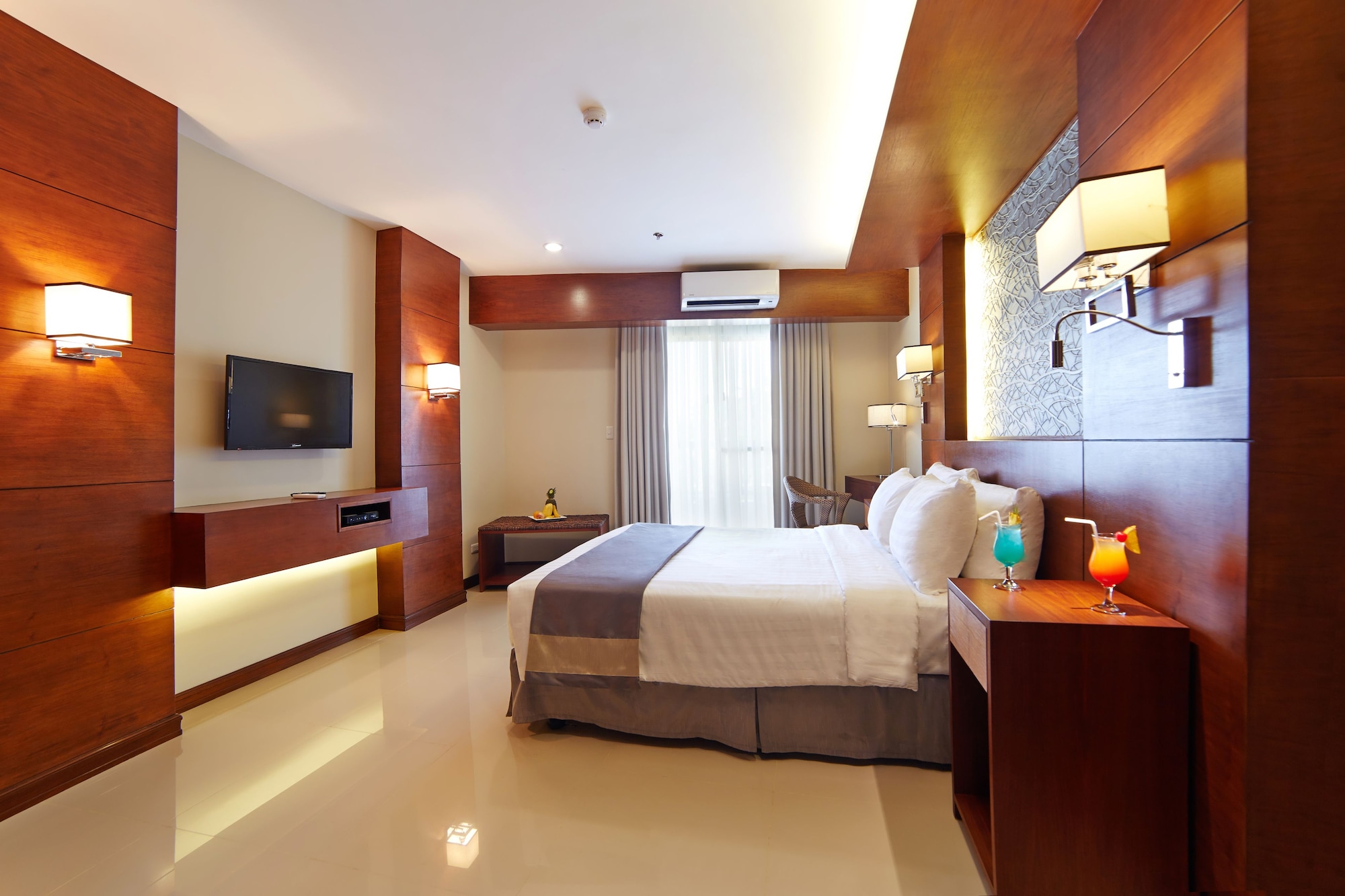 غرفة ديلوكس بسرير مزدوج وسرير فردي، CEBU WHITE SANDS RESORT AND SPA 5/6