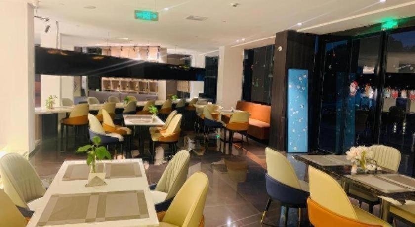 Magnolia Hotel (Yixing bus station store) 53/64