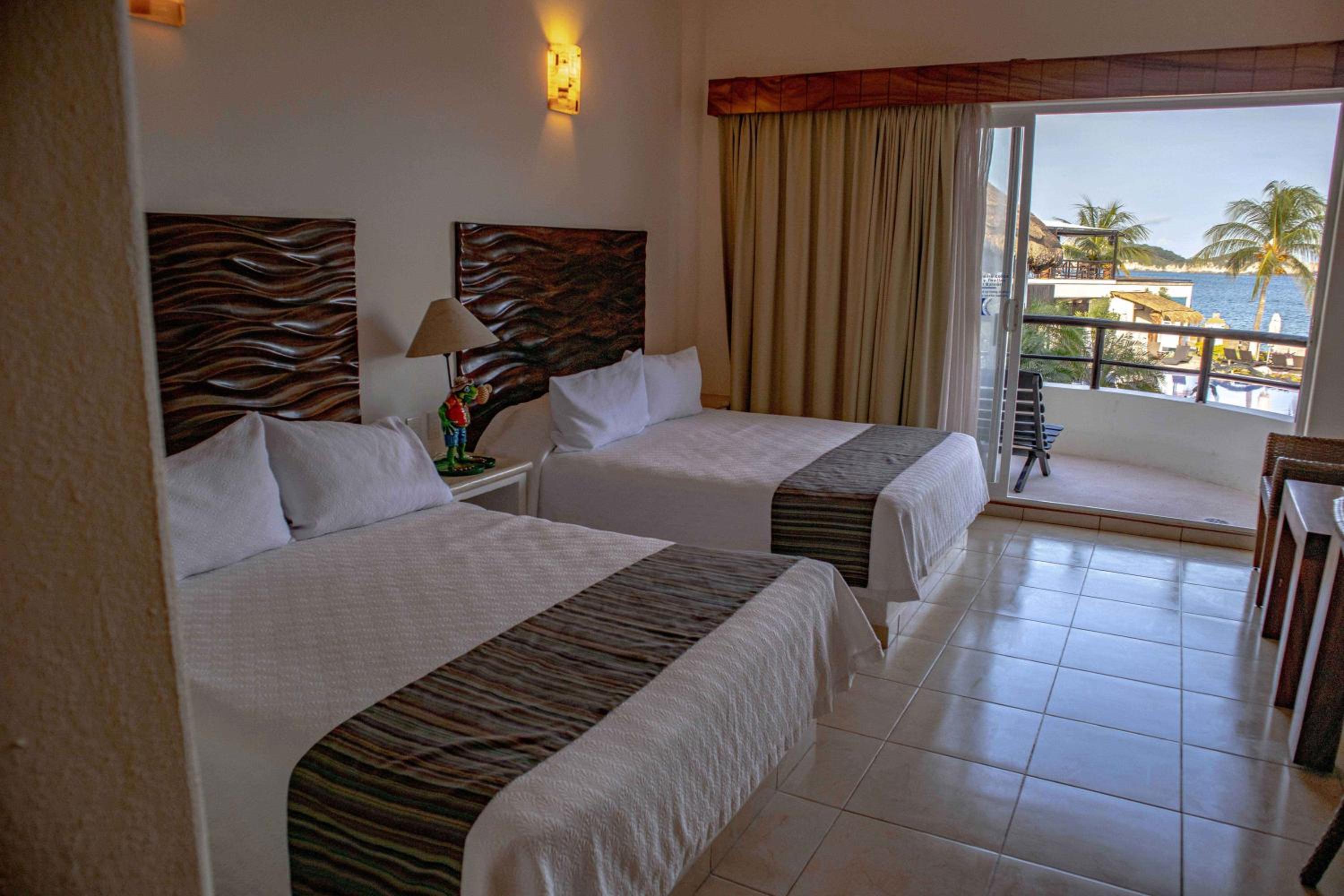 غرفة قياسية بسرير مزدوج بشرفة بإطلالة جزئية على البحر، Quinta Bella Huatulco 4/4